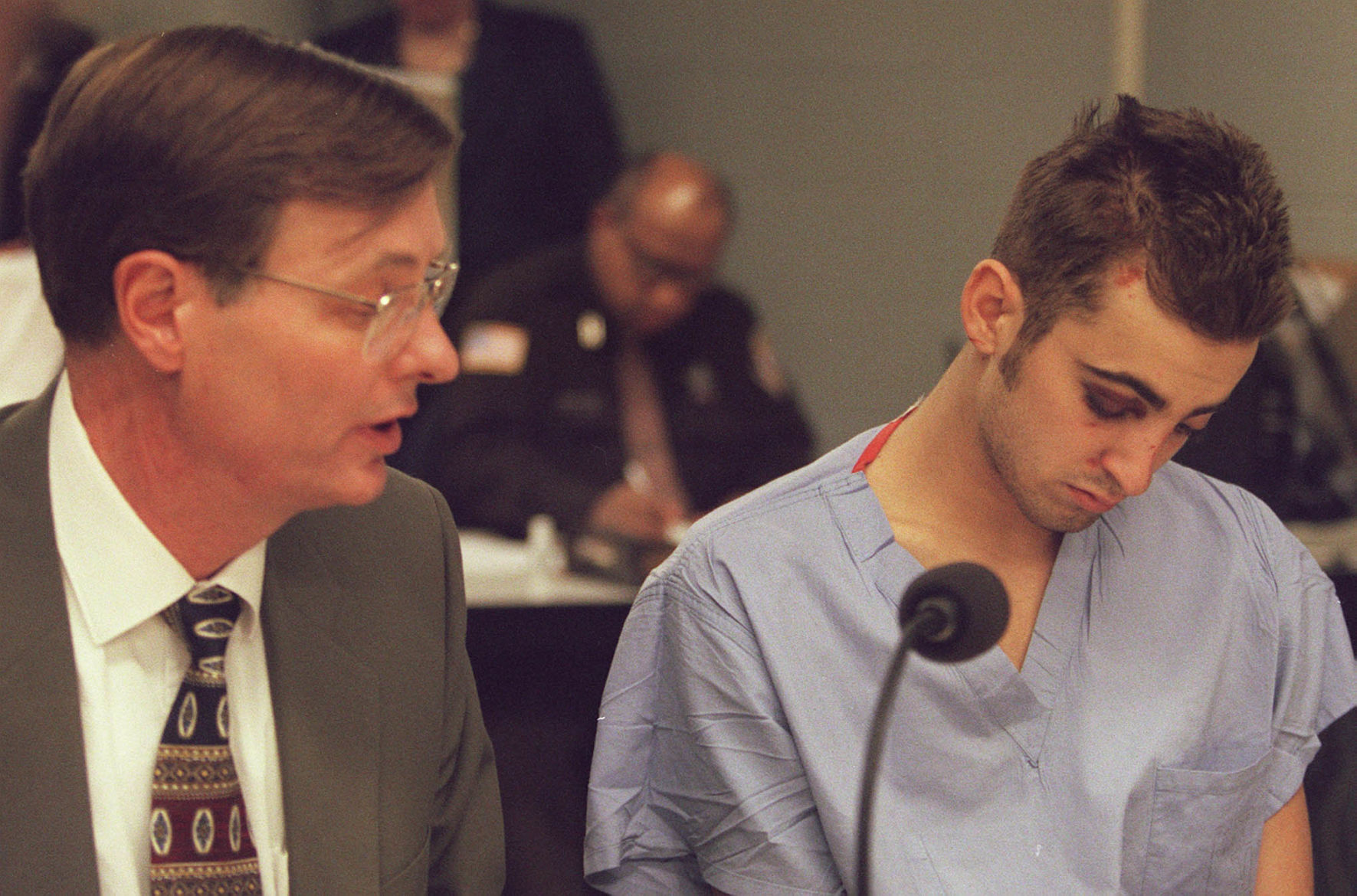 Holmes appears in court